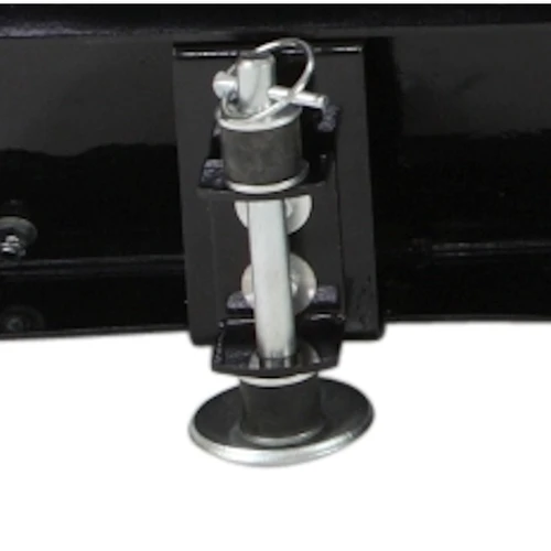 Denali replacement skid foot installed in the plow blade bracket, close-up showing the lynch pin and adjustable post