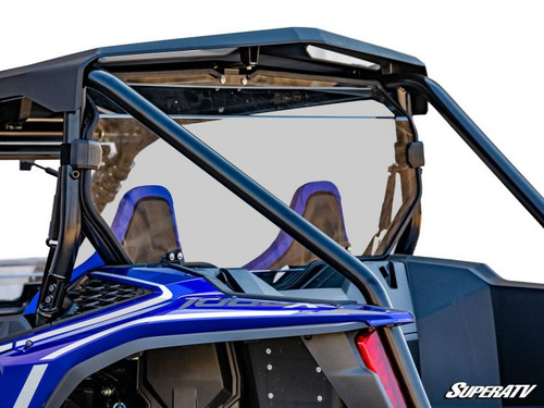 SuperATV clear rear windshield installed behind the seats of a blue Honda Talon 1000, close rear view under the roof