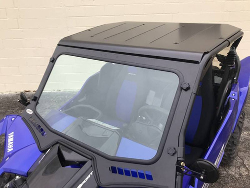 Extreme Metal Products laminated glass windshield with black frame and vent slots on a blue Yamaha YXZ, front three-quarter