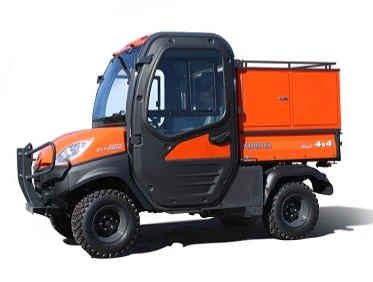 Kubota RTV 900/1100 with cab fitted with the Wiedmann Bros Challenger 24 inch bed cap, front three-quarter view