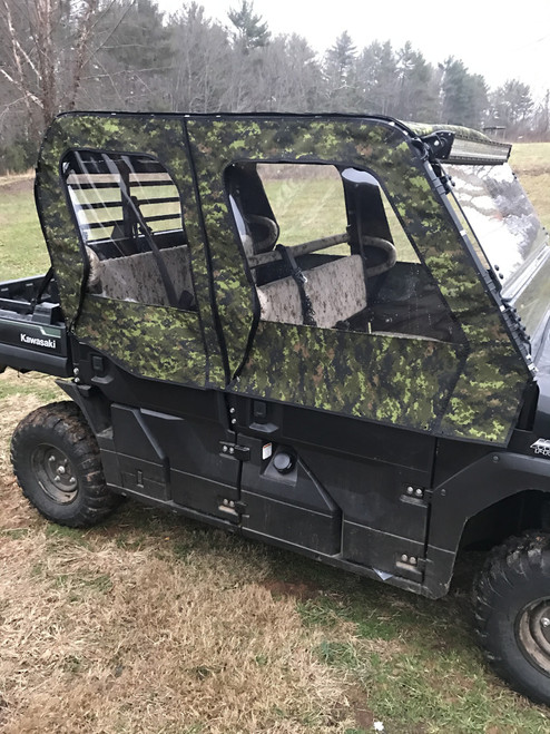 Greene Mountain camo soft doors on a Kawasaki Mule ProFXT, front three-quarter view of the crew cab