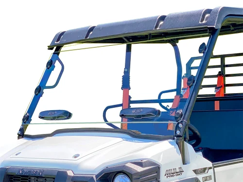 Spike windshield for Kawasaki Mule Pro-FXR: vented windshield on a white Kawasaki Mule, front corner close-up
