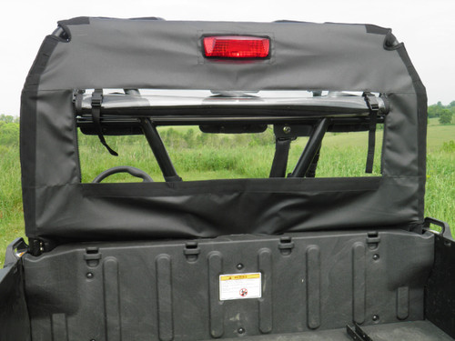 3 Star rear window panel with brake light cutout seen from the bed of an Arctic Cat Prowler 650