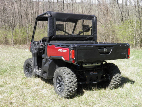 Rear three-quarter view of a red side-by-side with the 3 Star soft top and rear window panel