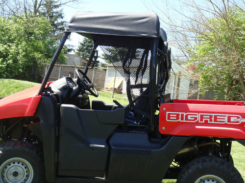 Side close-up of the 3 Star soft top over the Honda Big Red cab with steering wheel and seats