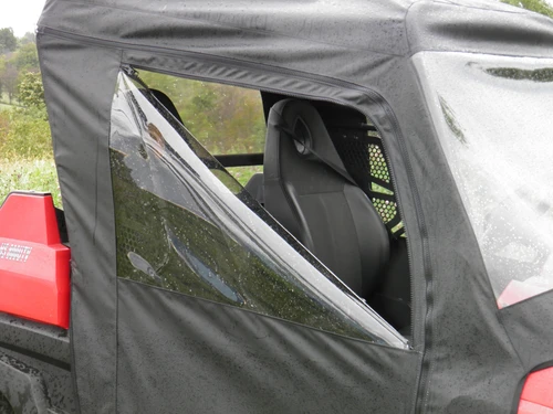 Close-up of the 3 Star soft door on the Pioneer 700-2 with the window unzipped and folded down