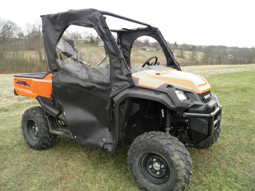 3 Star black soft doors installed on an orange Honda Pioneer 1000, front three-quarter view in a field