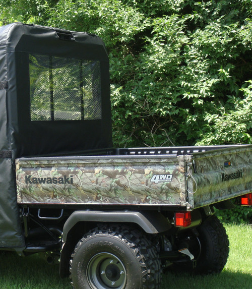 3 Star black soft back panel with window installed behind the cab of a camo Kawasaki Mule, rear corner view