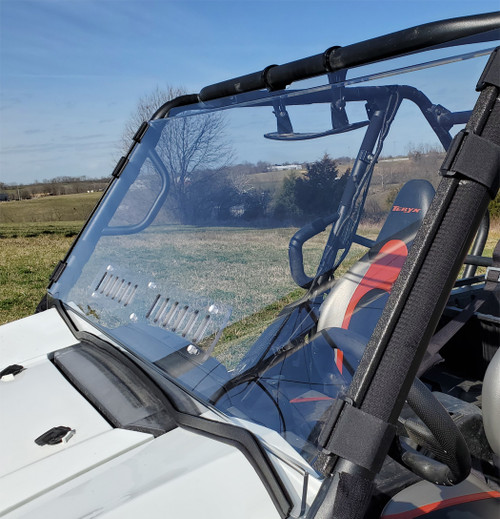 3 Star clear one-piece windshield with black clamp straps on a white Kawasaki Teryx 4, front three-quarter view