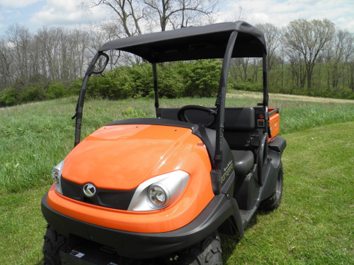 3 Star black soft top installed on an orange Kubota RTV500, front three-quarter view on grass