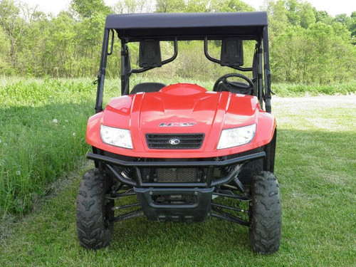 Straight front view of the red Kymco 700 with the 3 Star black soft top in a grass field