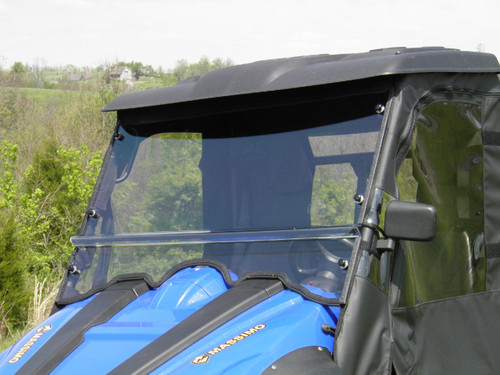 3 Star 2-piece windshield installed on a blue Massimo MSU with soft cab, front three-quarter close view