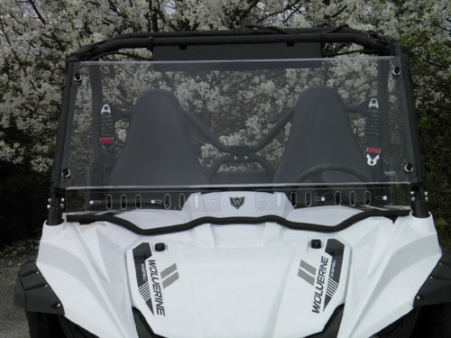 Yamaha Wolverine one-piece windshield installed, straight-on front view showing the full clear windshield