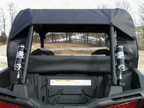 3 Star soft back panel in black with clear window behind the seats of a black Polaris RZR, rear close-up