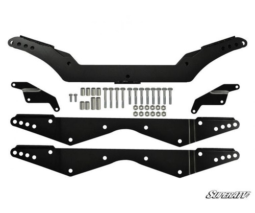 SuperATV Polaris RZR S 800 2-3 inch lift kit parts laid out: black brackets, radius plates, bolts and spacers