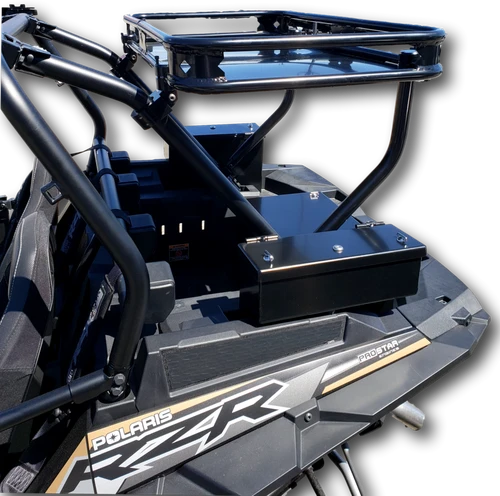 Close-up of the Hi-Standard Polaris RZR rear cargo rack uprights bolted to a black base box on the bed