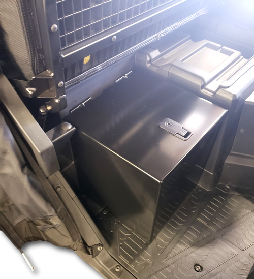Close view of the closed Hi-Standard security box with latch on the floor of a Polaris Ranger with the seat flipped up