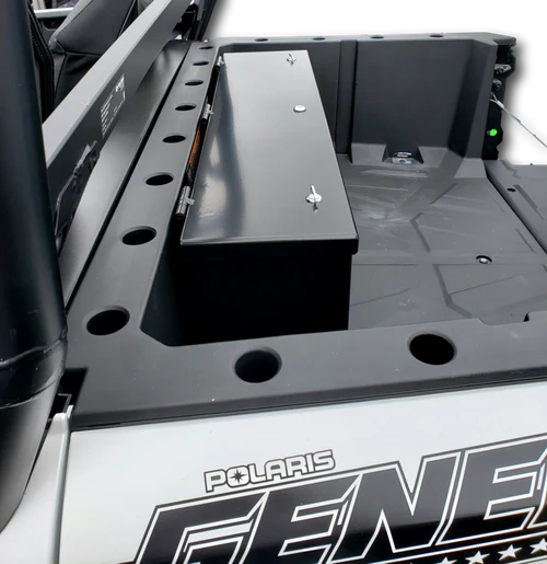 Hi-Standard black steel storage security box mounted at the front of a white Polaris General 1000 bed, lid closed