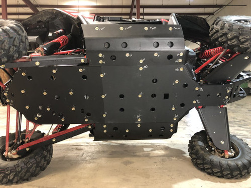 Trail Armor full skid plate installed under a Honda Talon 1000R, side view of the black UHMW belly panel and bolts