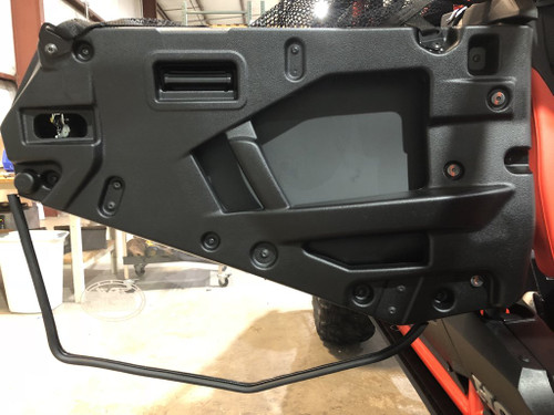 Trail Armor lower door insert on the Honda Talon 1000X-4 seen from inside the open door with rubber edge trim