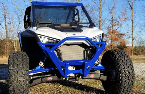 Trail Armor iMpact UHMW front arm guards installed on a blue Polaris RZR Pro XP, front view on a gravel lot