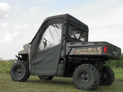 3 Star full cab enclosure installed on a camo Polaris Ranger, rear three-quarter view showing door and rear window