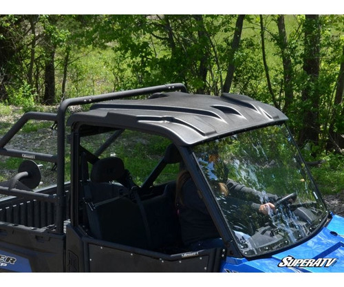SuperATV black plastic roof on a blue Polaris Ranger 1000 with a windshield, front three-quarter view in the woods