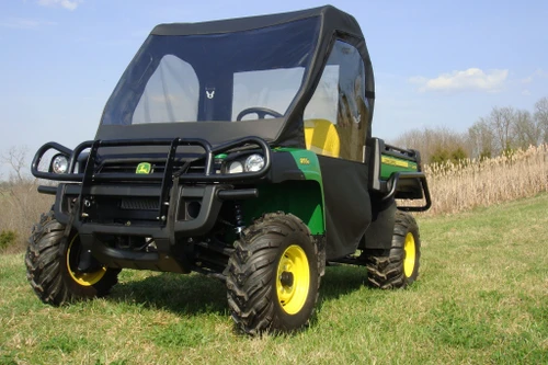 3 Star soft cab enclosure with vinyl windshield on a John Deere Gator HPX, front three-quarter view