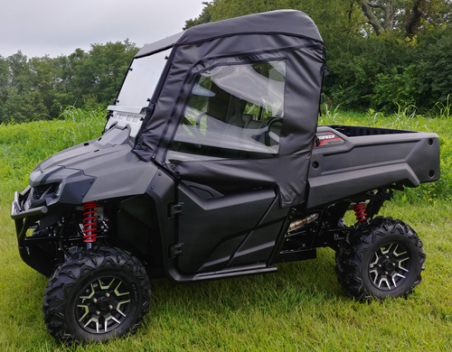 3 Star full cab enclosure with hard windshield on a gray Honda Pioneer 700-2, driver side profile
