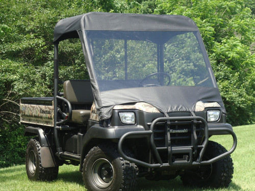 Front three-quarter view of a camo-bed Kawasaki Mule 4010 with the 3 Star black vinyl top and clear windshield