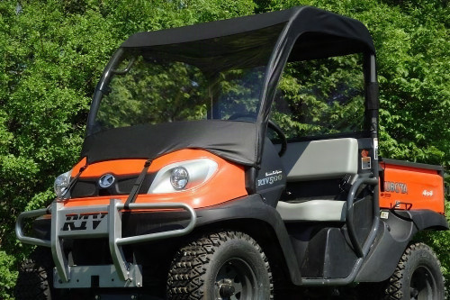 3 Star vinyl windshield and black top installed on an orange Kubota RTV 500, front three-quarter view in a field