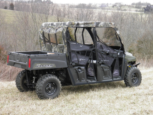 3 Star vinyl windshield, top and rear window combo on a camouflage four-door Polaris Ranger, side view