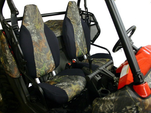 Greene Mountain camo seat covers with black bolsters installed on the front seats of a Polaris RZR