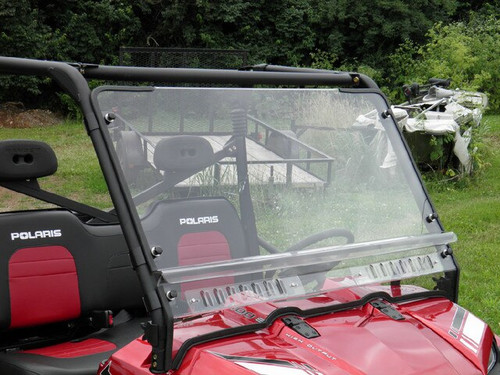 3 Star scratch-resistant windshield on a red Polaris Ranger XP, driver side view showing a vented split lower panel