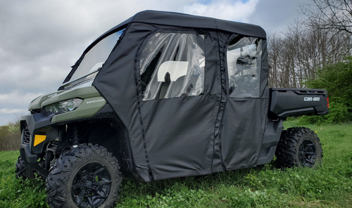 Side profile of the green Can-Am Defender Max with the 3 Star soft cab enclosure and zip-window doors
