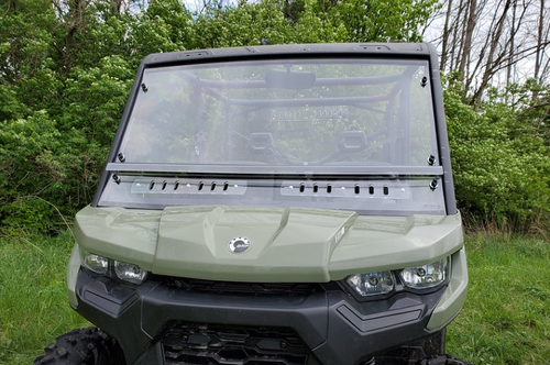 Front view of the 3 Star two-piece scratch-resistant windshield with vent slots on a green Can-Am Defender Max