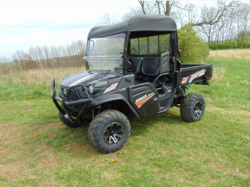 3 Star soft top installed on a black Kubota RTV XG850 with cab, front three-quarter view on a grassy field