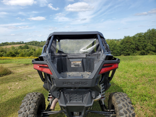 3 Star black soft back panel with clear window on a Polaris RZR Pro XP, straight rear view in a field