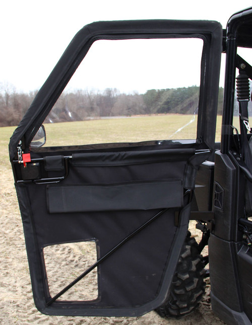 Seizmik framed door swung open on the Polaris Ranger showing the black fabric panel, clear upper window and lower mesh window