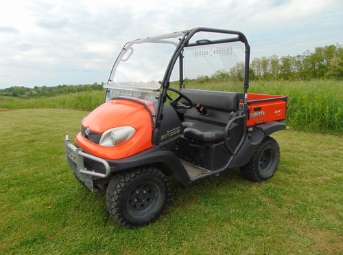 3 Star Lexan rear window installed on an orange Kubota RTV X900/X1120D, front three-quarter view