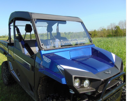 Passenger side three-quarter view of a blue Arctic Cat Stampede with the 3 Star scratch-resistant windshield
