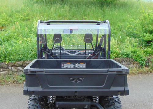 3 Star one-piece Lexan back panel on an Arctic Cat Stampede, clear panel behind the cargo bed, straight rear view outdoors