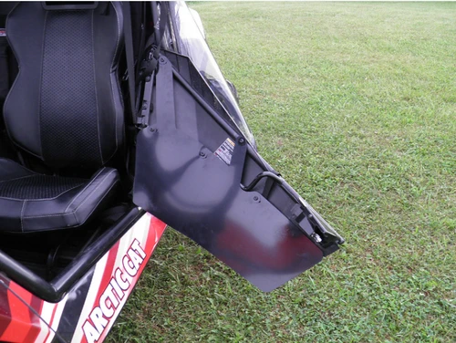 3 Star ABS lower door insert on the Arctic Cat Wildcat with the door swung open showing the inside panel