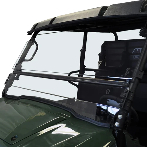 Kolpin full tilt windshield on a green Kawasaki Mule Pro, front view over the hood with a storage box behind the cab