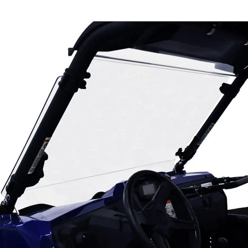 Kolpin Full Tilt windshield on a blue Yamaha Wolverine, front three-quarter view showing the clear panel and cage clamps