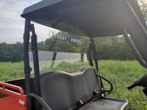 View from inside the cab of the 3 Star Lexan back panel behind the bench seat of the Coleman UT400