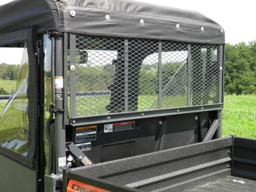 3 Star Lexan back panel mounted over the mesh rear screen of a green side-by-side with soft top, rear view