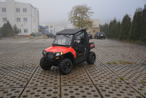 Polaris RZR 570 hard cab enclosure by HardCabs - steel roof, tilt-out glass windshield, poly doors