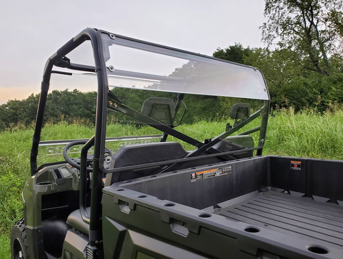 3 Star 1-piece Lexan back panel installed on a green Polaris Ranger Crew, seen from the cargo bed side