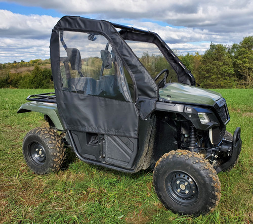 3 Star soft doors kit installed on a green Honda Pioneer 500, front three-quarter view in a field